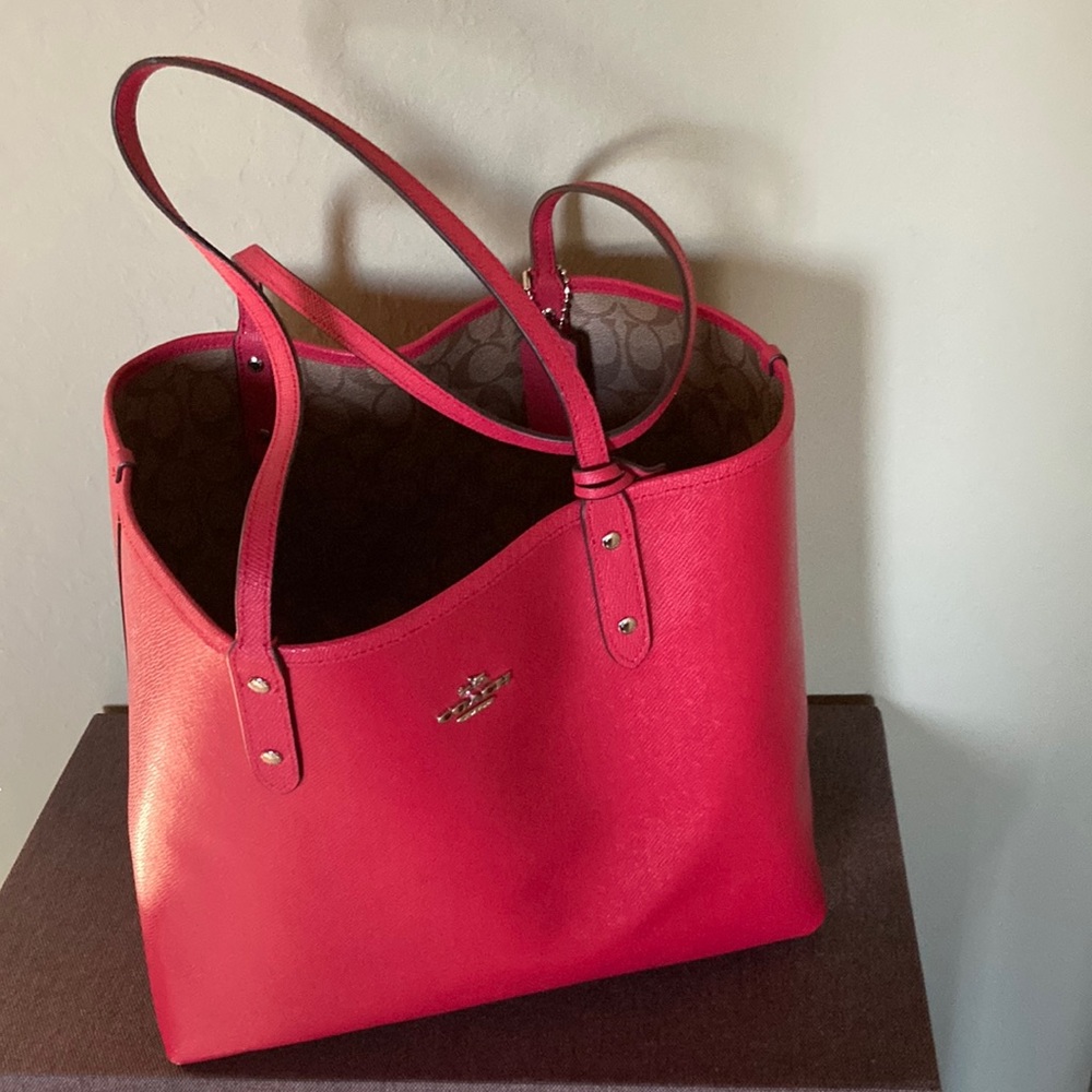 Reversible Coach tote with detachable pouch, keychain